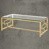 Coffee table with clear glass top and high polished gold plated stainless steel base