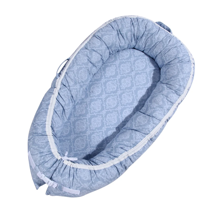 snuggle nest baby lounger