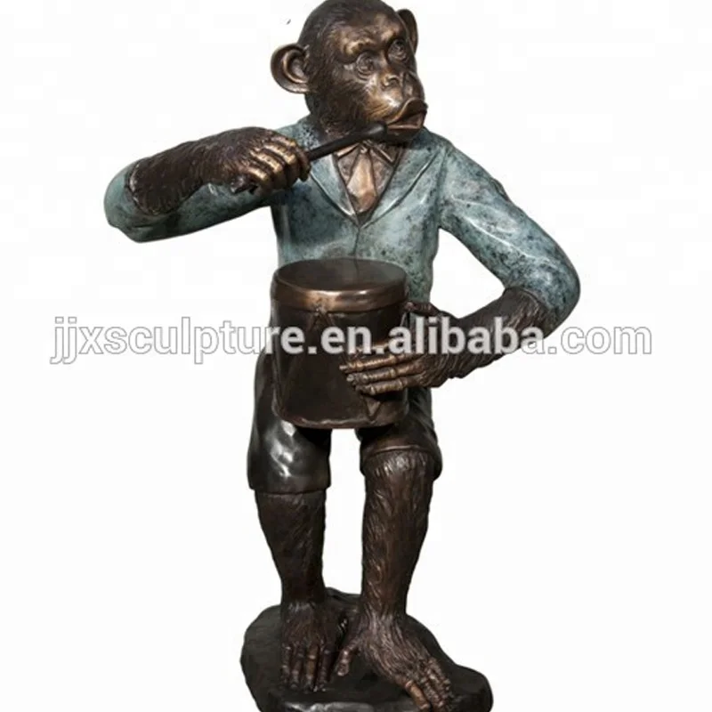 Bronze affen playing drum statue