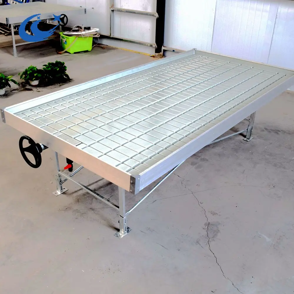Vertical hydroponic farming system rolling bench ebb and flow table