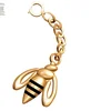 customized logo very cute bee shaped golden color keychain