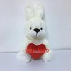 free sample plush stuffed rabbit with heart for Valentine's gift/Promotional plush cute white easter bunny toy with heart