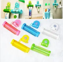 Plastic Rolling Tube Squeezer Useful Toothpaste Easy Dispenser Bathroom Holder Free Shipping