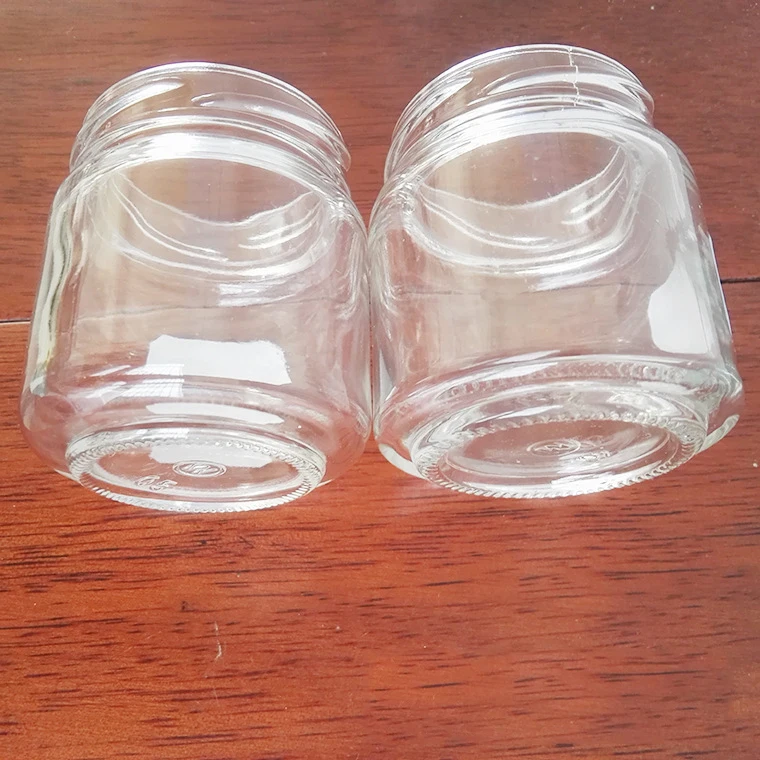 Factory Customization Small Food Grade Round Glass Honey Jar
