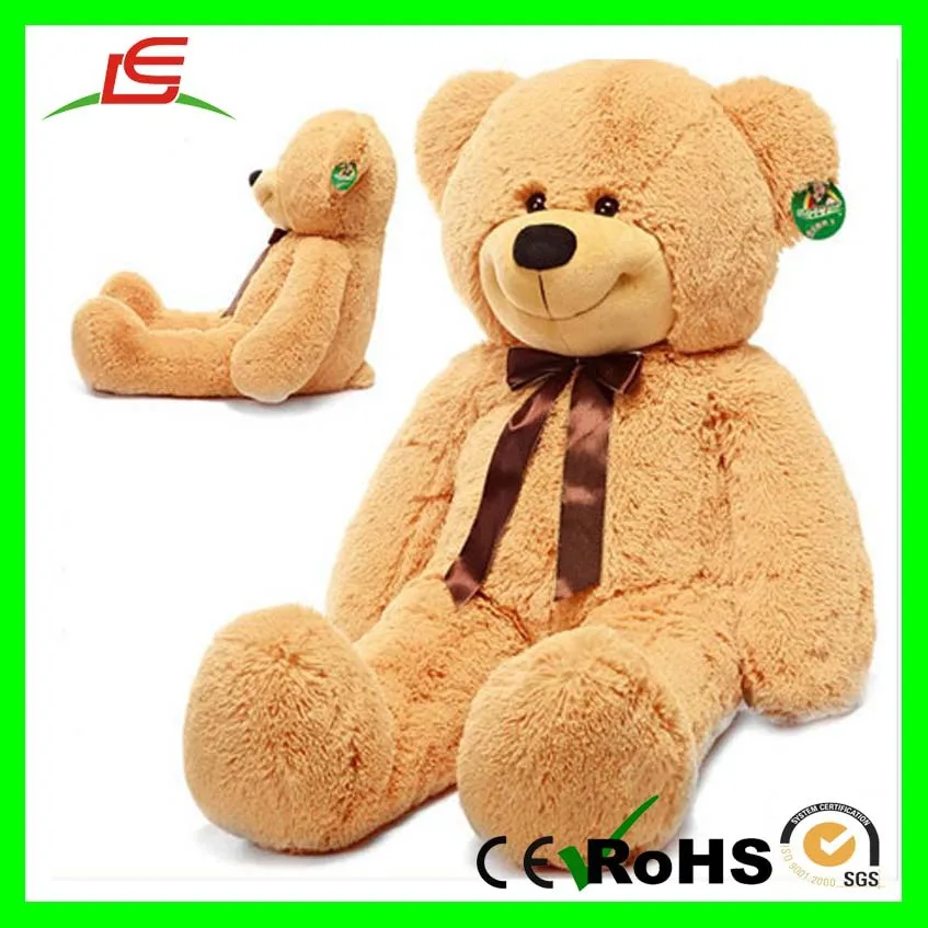 brown teddy bear with bow tie