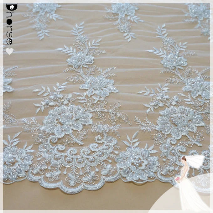 white beaded lace fabric