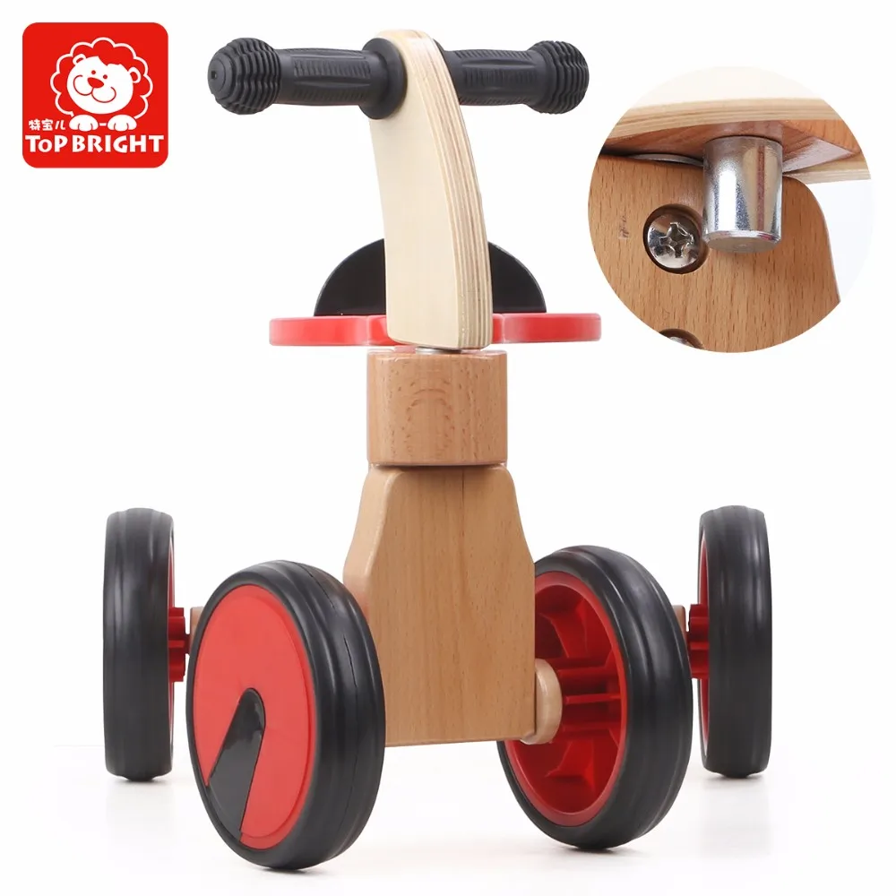 top bright wooden ride on