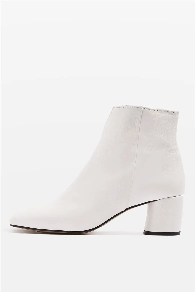 white cut out ankle boots