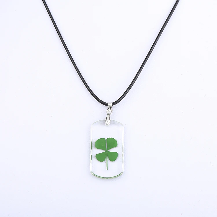 Necklace, resin/four-leaf clover/cotton, green/clear/black