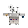 Automatic adhesive label applicator and flat and top surface labeling machine for box and bottles price