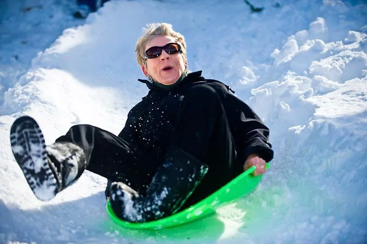 Image result for adult on a sled