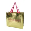 Gold metallic non woven laminated shopping bag with pink handles for America market