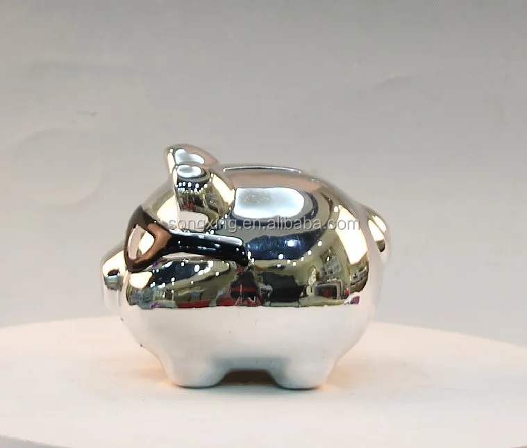 ceramic mini piggy bank with black glass.jpg
