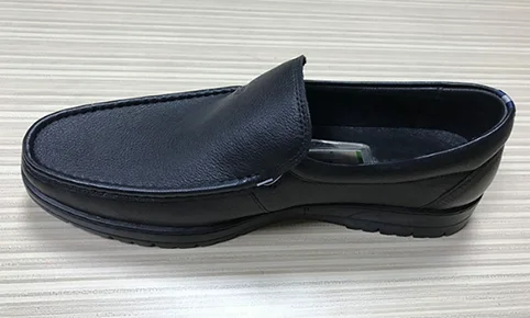black leather shoe.png