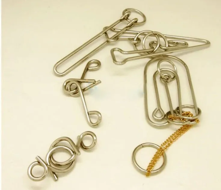 Magic Tricks Fashion 3d Metal Wire Puzzle Iq Jigsaw Puzzle Cast Metal