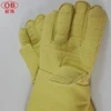 Yellow safety gloves on metal extrusion machine