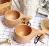 Manually export the original single wood beech trunk with two holes handle the whole coffee mug
