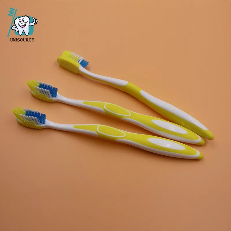 Wholesale Toothbrush Adult Yellow Color With Rubber Massager Buy