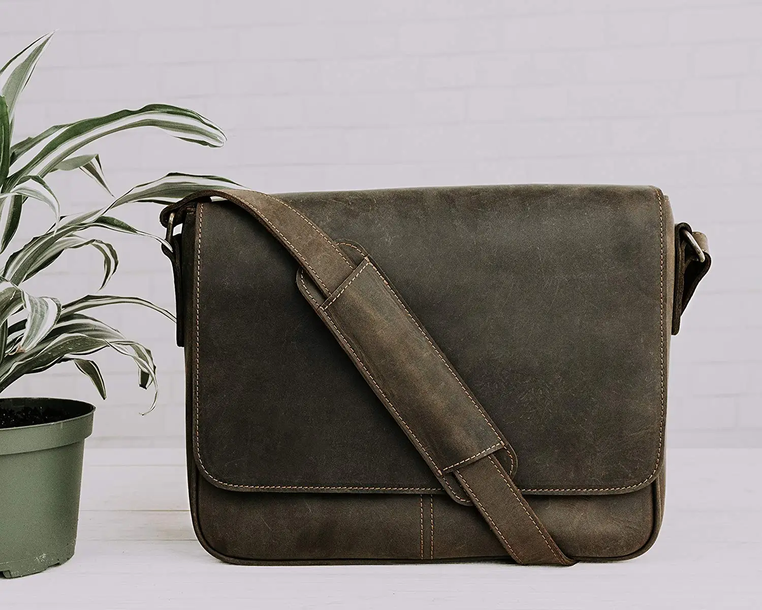 brown distressed leather messenger bag