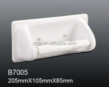 white ceramic toilet roll holder