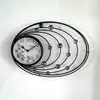 Metal wall mounted clock