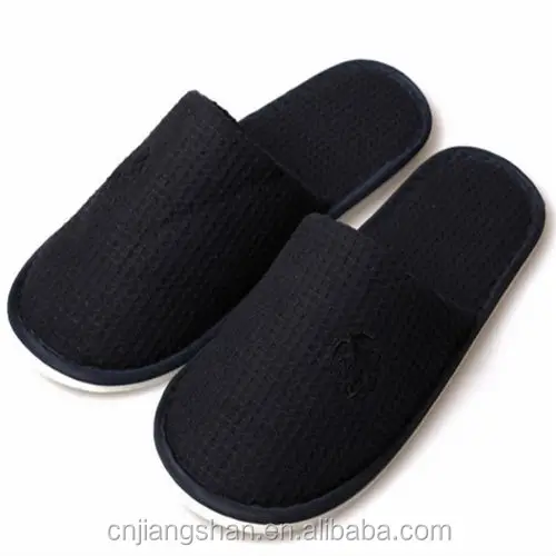 black hotel slippers