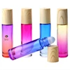 /product-detail/luxury-10ml-gradient-color-essential-oil-glass-roller-bottle-roll-on-fragrance-oil-bottle-with-wood-grain-cap-wholesale-62138119445.html