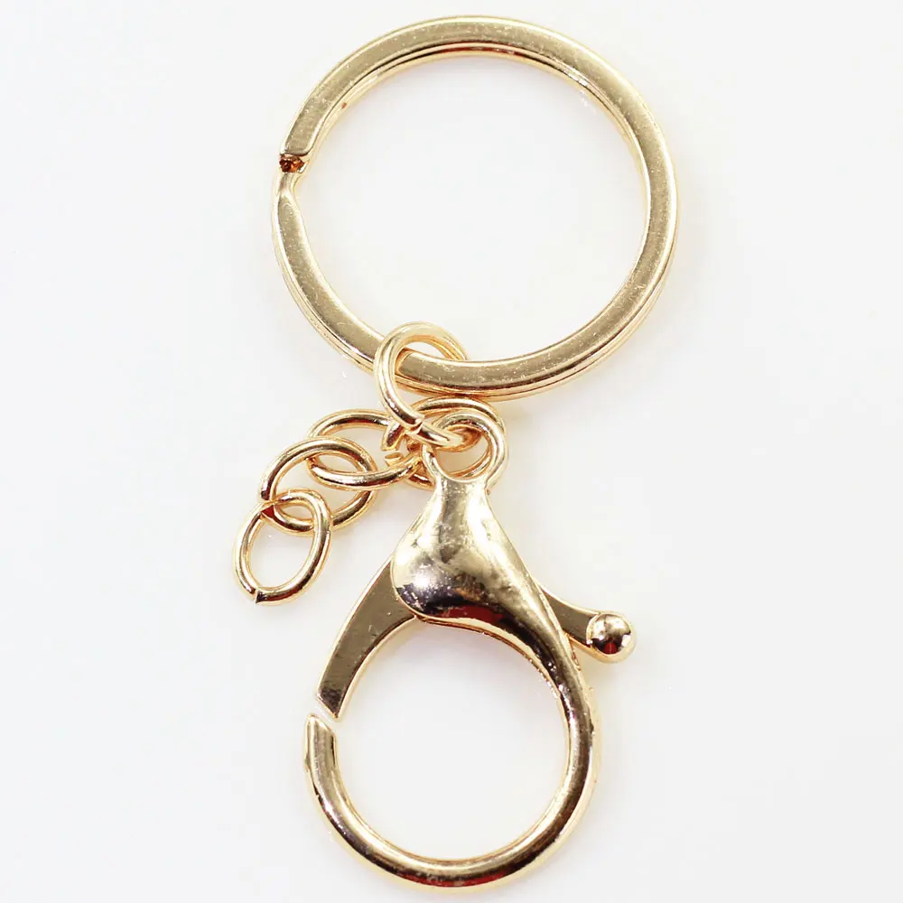 Selling Well Gold Keychains 100pcs/bag Hot Popular Key Rings For Car
