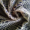 China wholesale panne silk velvet fabric with fashion print snakeskin strip patterns