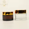 /product-detail/50-100ml-clear-glass-jar-metal-lid-custom-made-cosmetic-cream-jars-wholesale-bottles-and-jars-in-dubai-60811523029.html