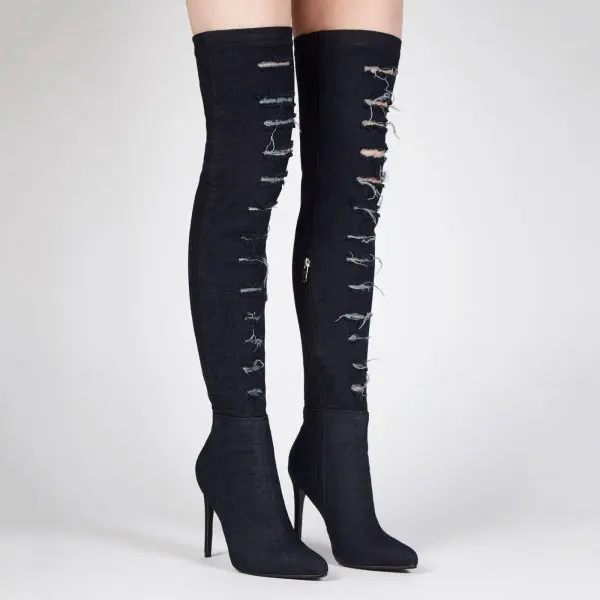 ripped jeans and thigh high boots
