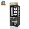 Popular coin operated golden key game claw machine 9 holes black mini keymaster