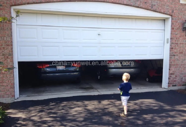 Unistrut Railing And Chain Hoist Trolley Thru A Garage Door Track