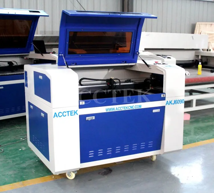 Cheap hot sale Acrylic laser cutting machine low cost CO2 laser engraving machine honeycomb or blade table