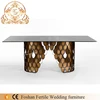 NEW ARRIVAL cool design snakeskin base glass dining room table