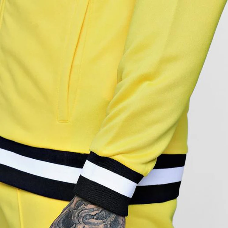 yellow tracksuit black stripe