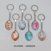 Oval shaped custom design single side glass metal keyring