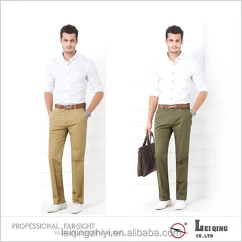 beige trousers and white shirt