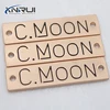 Electro chemical stainless steel etching with brass logo nameplates for bag