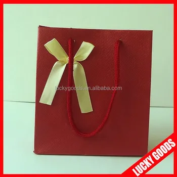 gift bags with ribbon ties