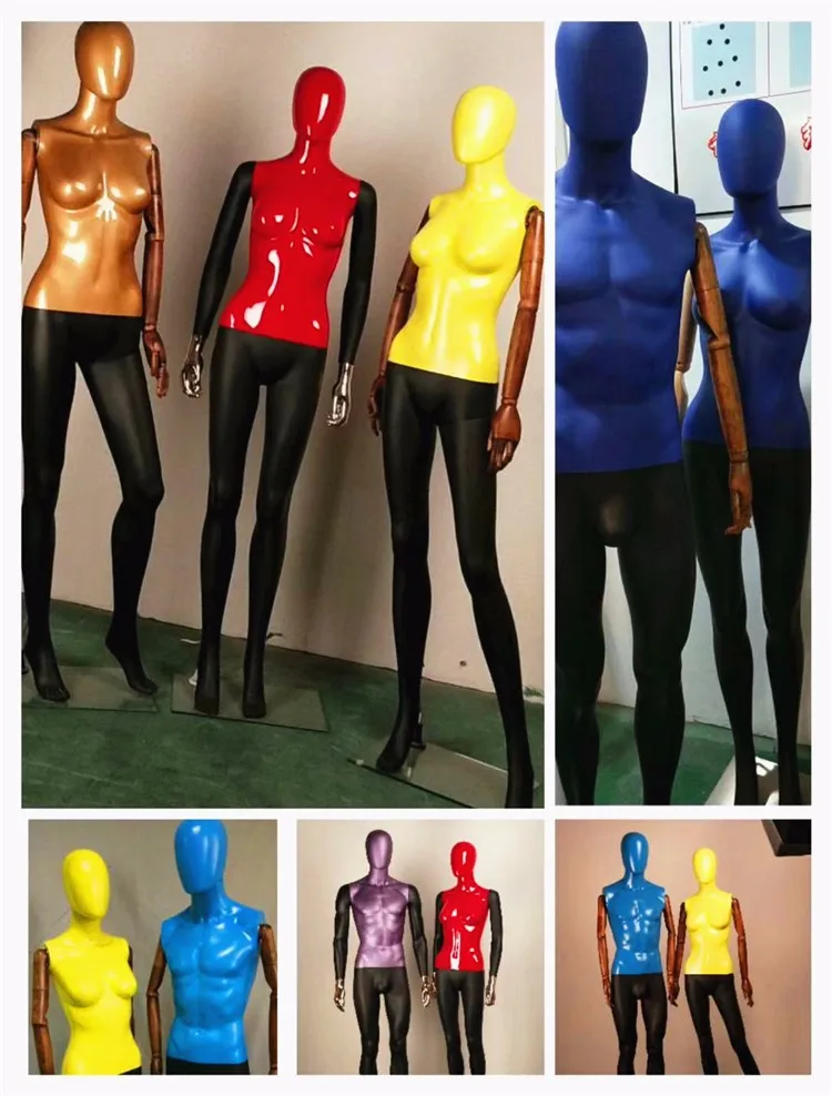 有光泽的黑色塑料人体模特与铬头和木臂