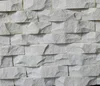Granite Snow white stacked stone fireplace