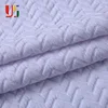 White polyester spandex elastic knitted wholesale garment jacquard fabric for clothing