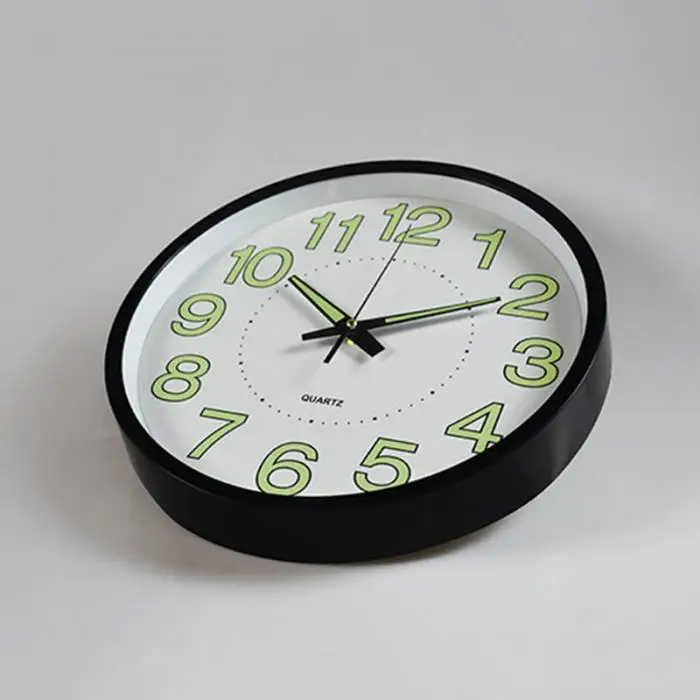 Description: 1. With easy to read numbers, so you can see the time easily from far away, and even easy to read in dim lighting. 2. Night lights function use, makes sure the clock absorb enough light, like light bulb or sunlight. 3. Classic look wall clock perfect for dining rooms, living rooms,family rooms, bedrooms, study room,kitchen, office and meeting room. 4. If you wanna make it brighter at dark, make sure the clock absorb enough light, like light bulb or sunlight. 5. Super-quality quartz movement guarantees accurate time and operates silently. 