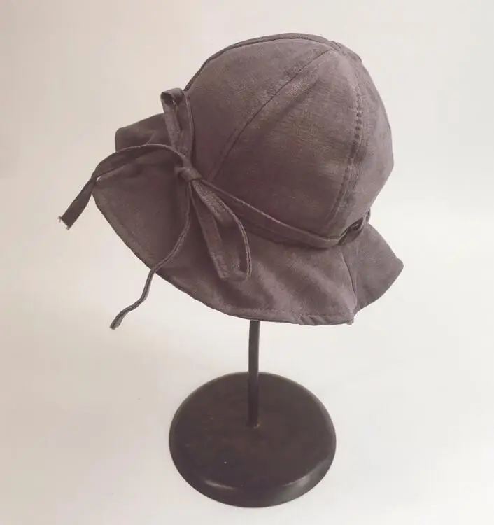 夏季用的桶帽穿着老式时尚鱼桶帽子与弓