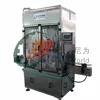 Filling and packaging cooking oil plastic bottles