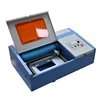 Mini size CO2 laser engraver for acrylic with low price In China