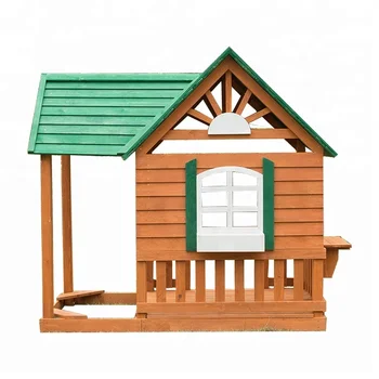 outdoor playhouse with sandbox