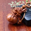 Wholesale High quality wood rabbit 3D carved keychain Cheap items to sell