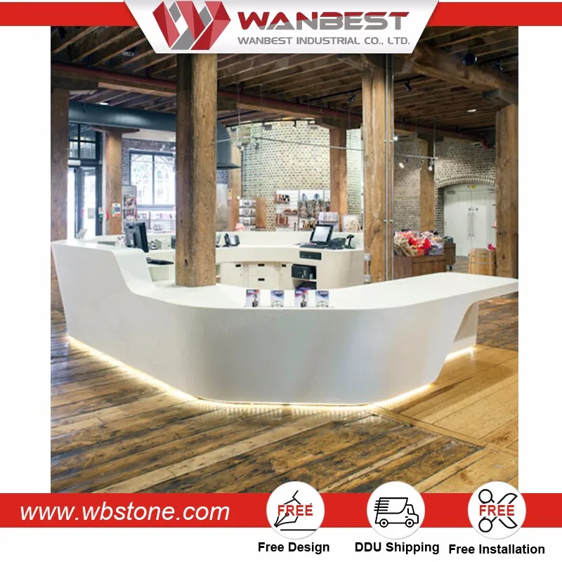 store counter clothes shop white tufted reception desk.jpg